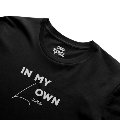 Close-up of minimalist graphic print on black streetwear t-shirt