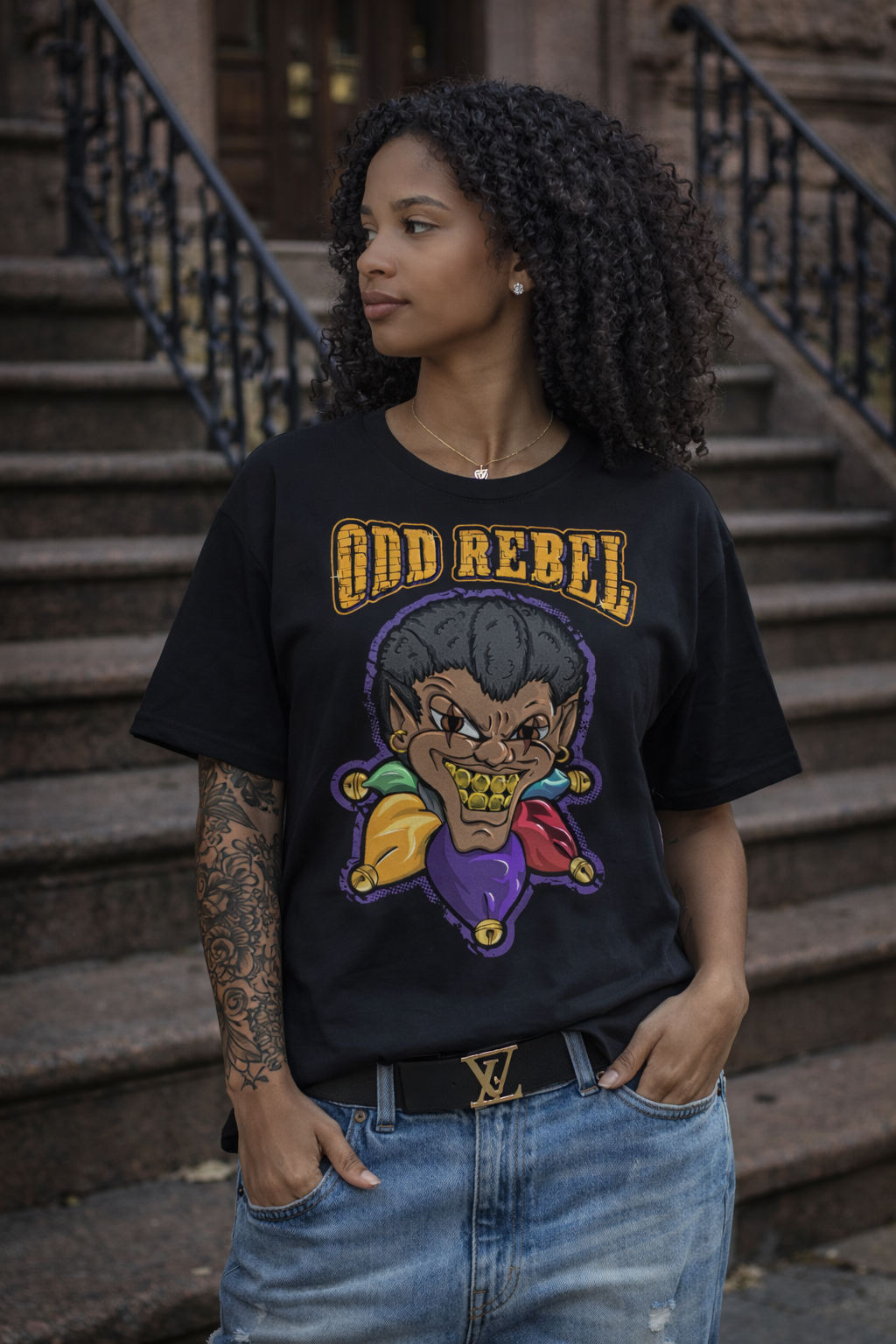 women's graphic t-shirt worn by model, black unisex urban tee with joker graphic 