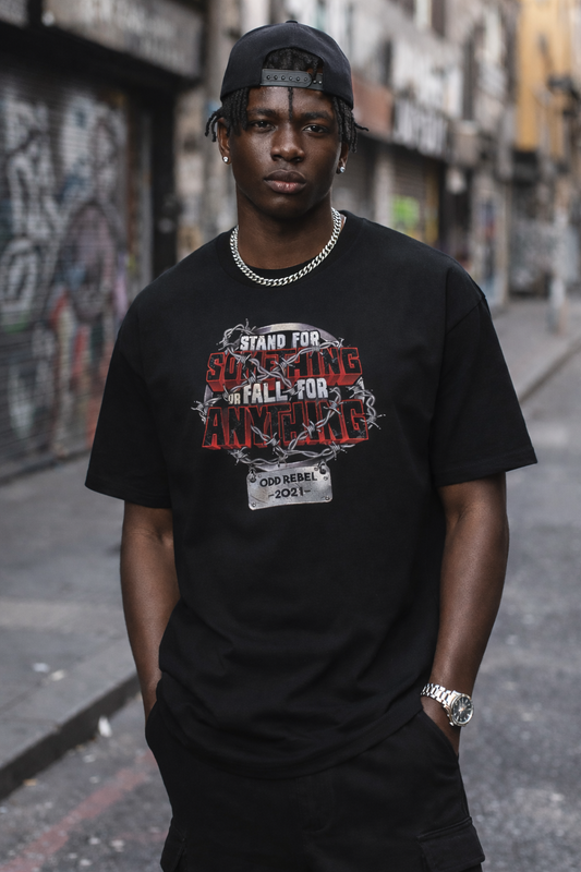 Men's streetwear t-shirt worn with urban outfit, graphic tee style